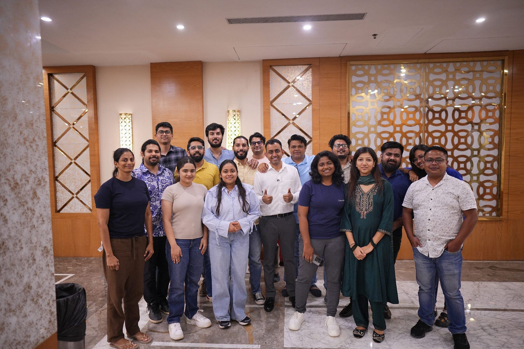 Full cohort of about eighteen sales reps with Srivaradha at the end of an in-person training program.